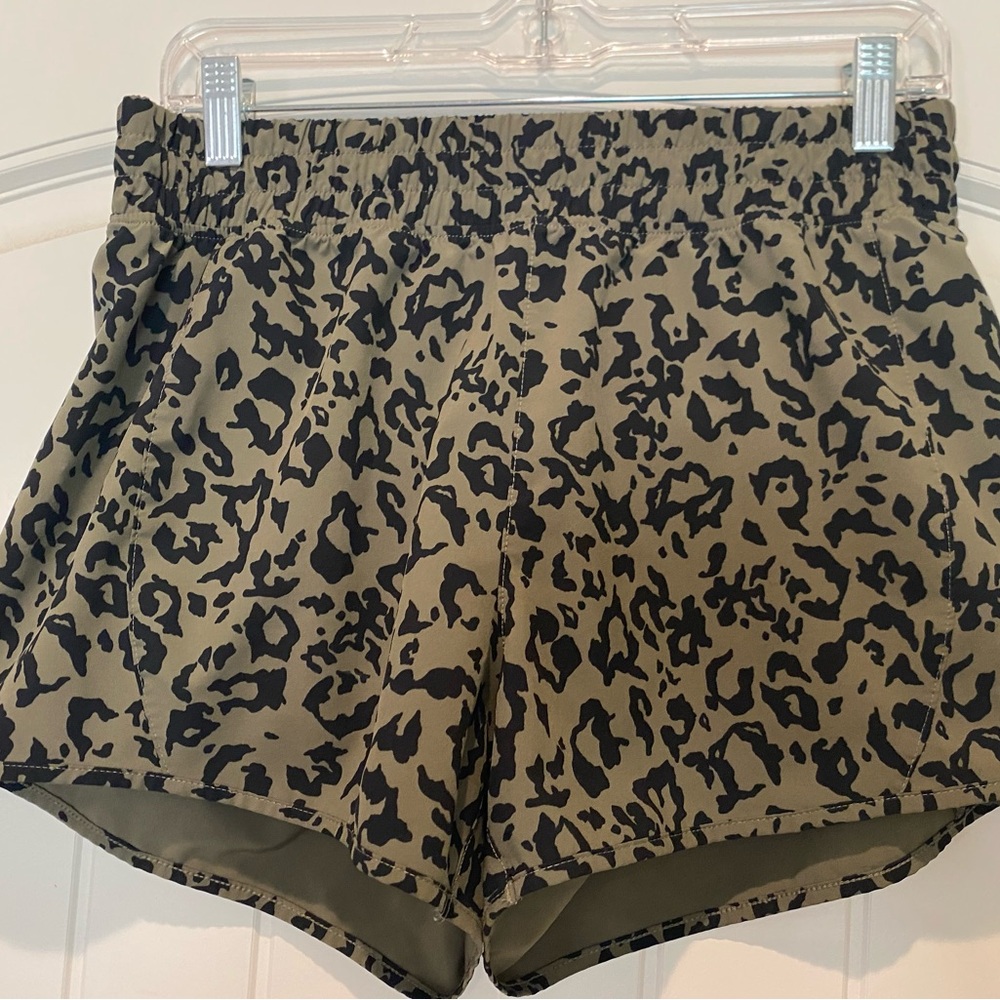 Leopard print green and black athletic women’s shorts by Marika size Medium